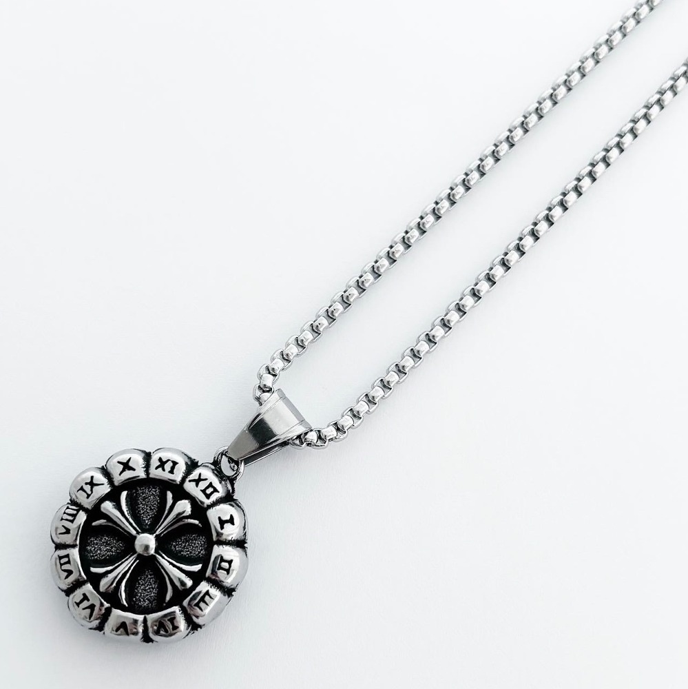 A skull compass necklace