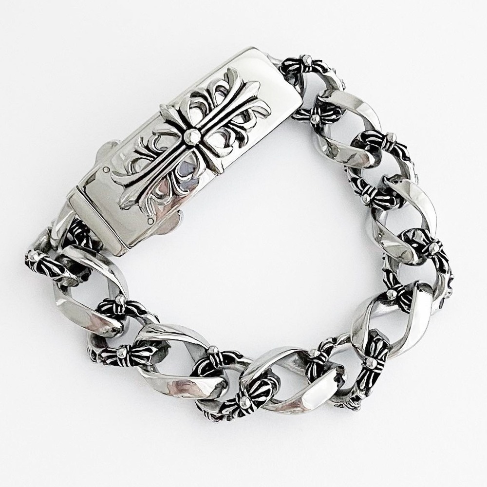 A cross-patterned chrome chain bracelet